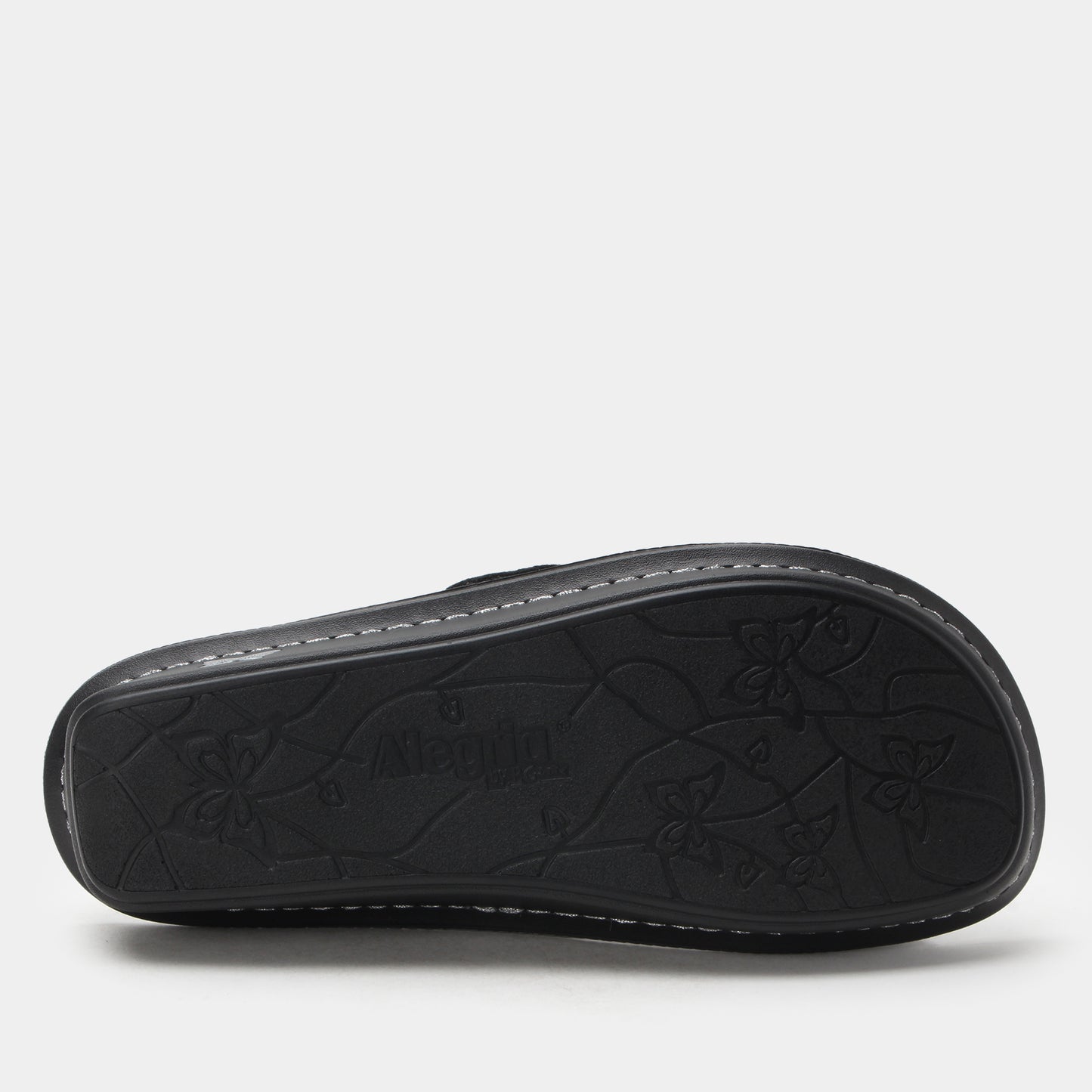 Black sandal sole with brand logo on a white background
