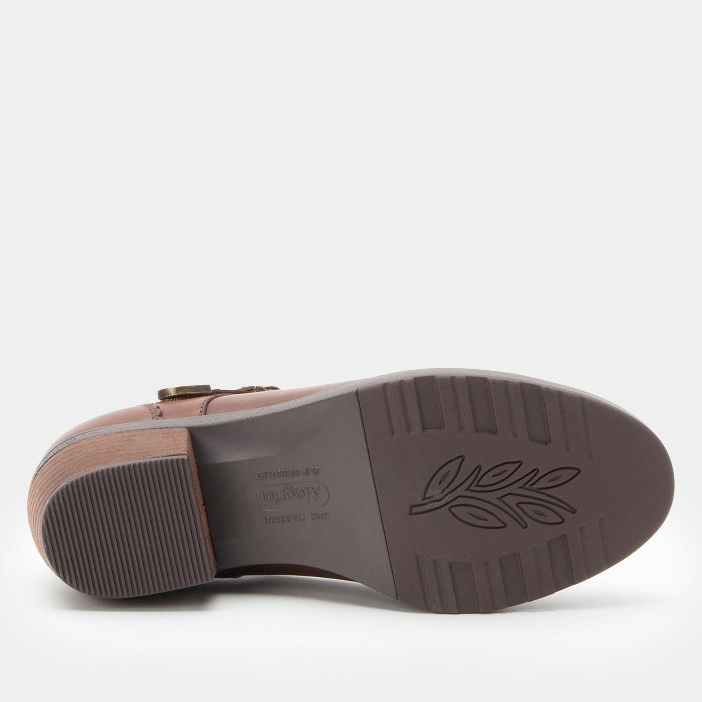 Black sole with circular pattern on a white background
